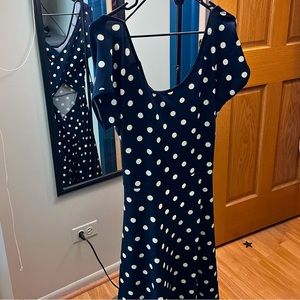 Navy and white polka dot dress w peekaboo lower back